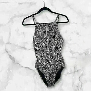 “Timeless Elegance: Black &  White Halter Swimsuit”